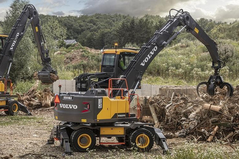 Volvo machines including, EW240E material handler